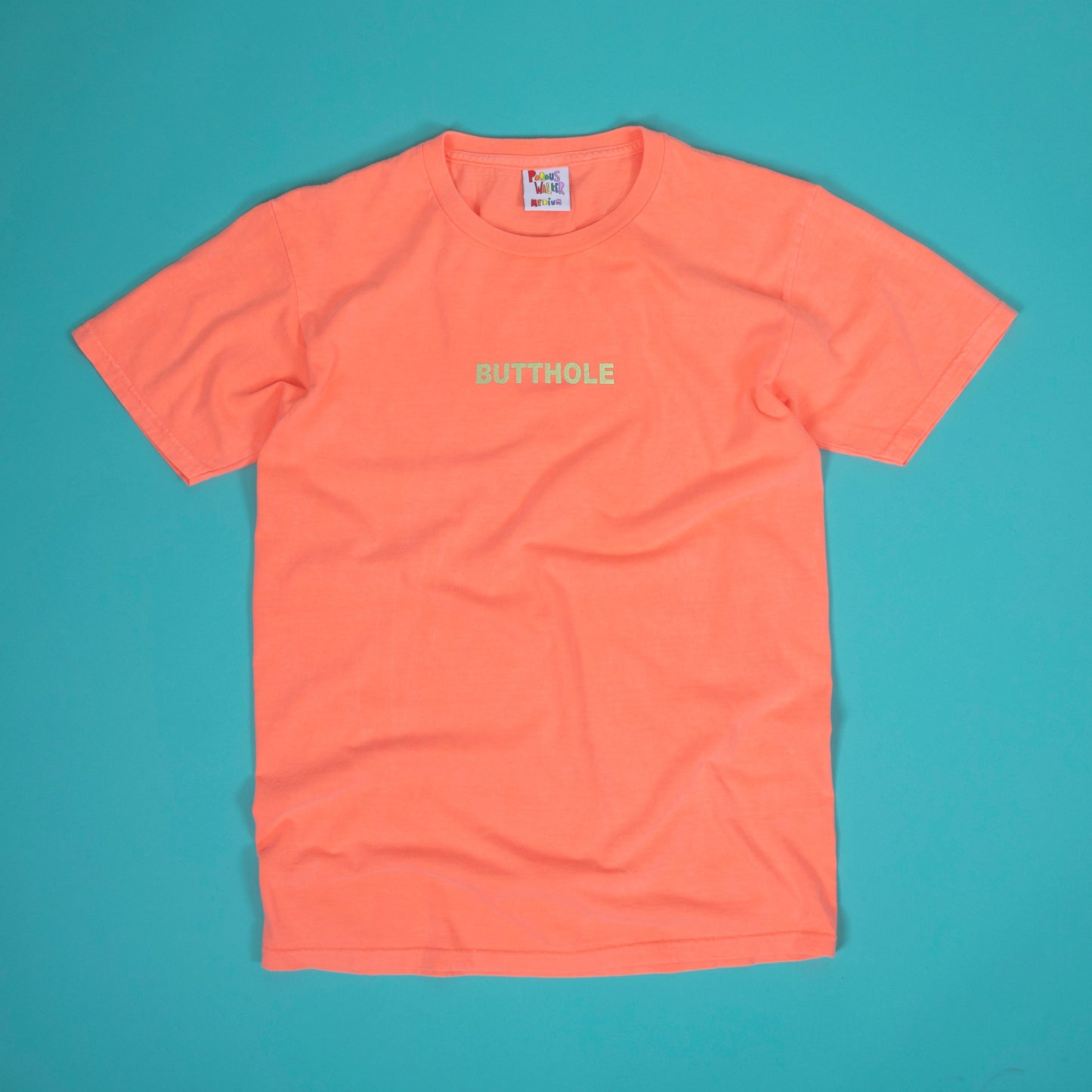 GLOW IN THE DARK BUTTHOLE Tee (NEON ORANGE) MISPRINTS