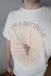 I'M A BUTTHOLE TEE (NATURAL)