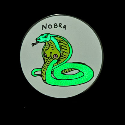 NOBRA ENAMEL PIN (GLOW IN THE DARK)