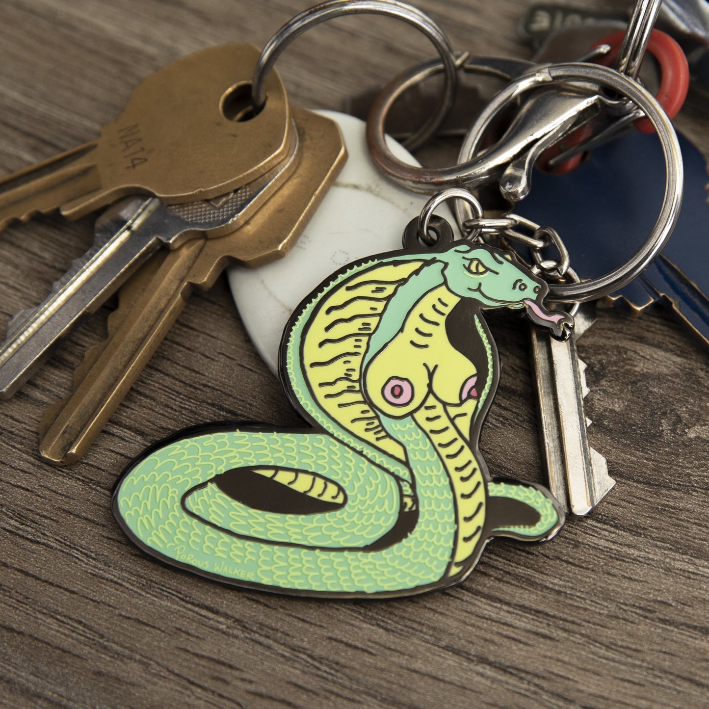 NOBRA KEYCHAIN (GLOW IN THE DARK)